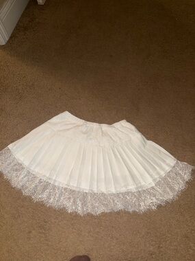 White Pleated Mini Skirt with Lace Trim